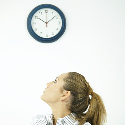woman-looking-at-clock